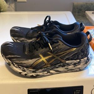 Women’s 8 ASICS Running Shoes.